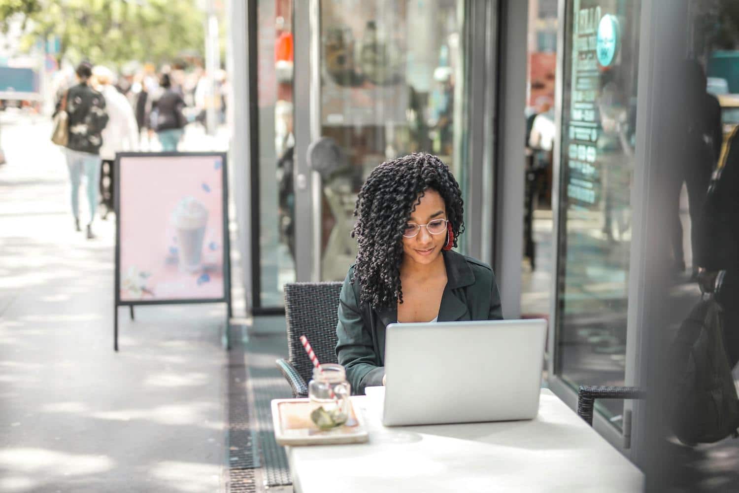 A woman learning the answer to what is a digital creator.