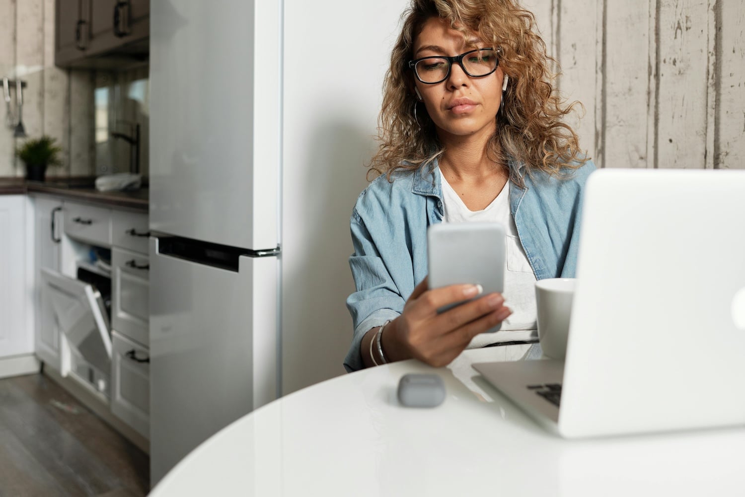 A woman looking up how to start a newsletter for her small business.