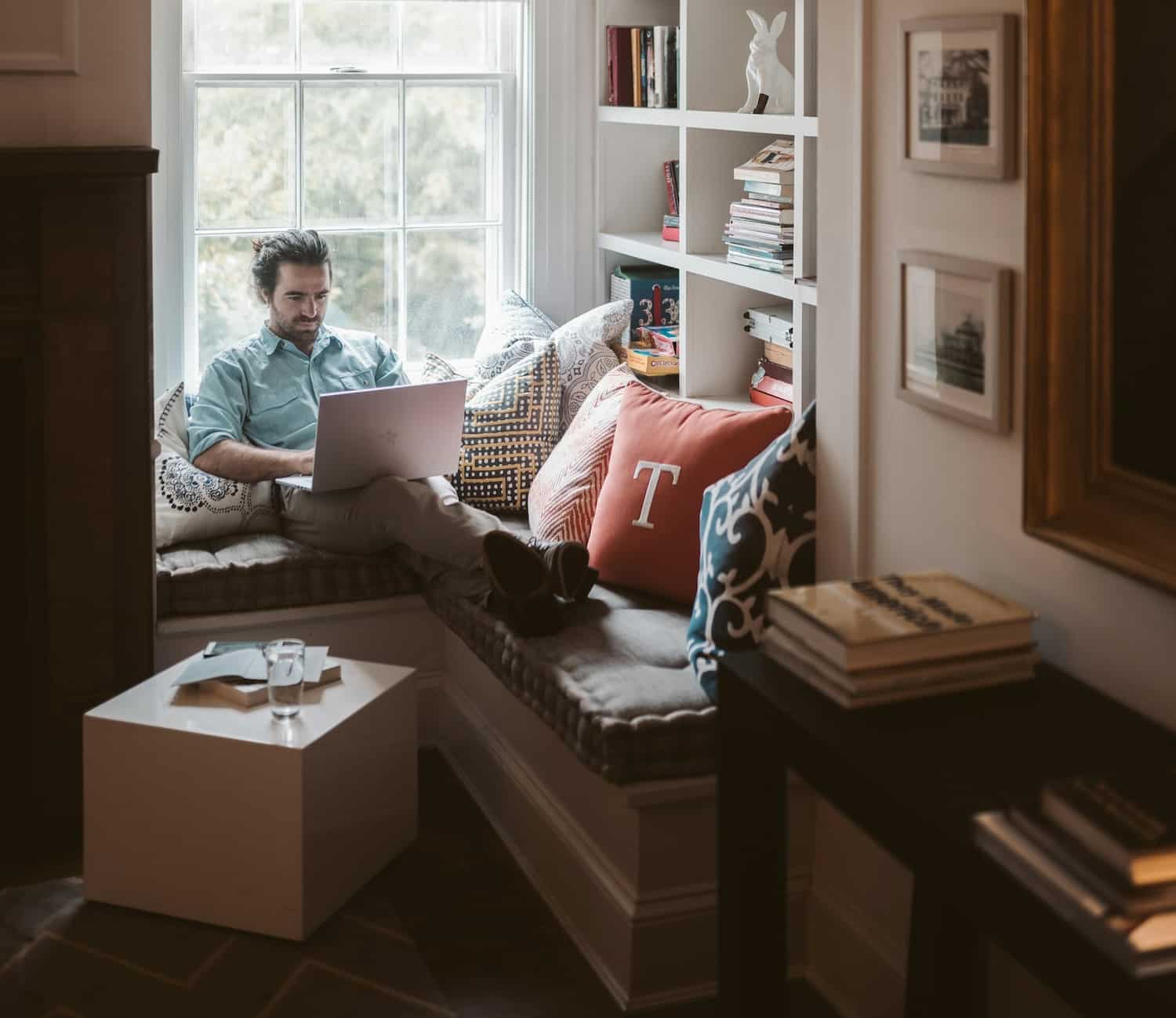 A man researching how to start a newsletter for his new company.