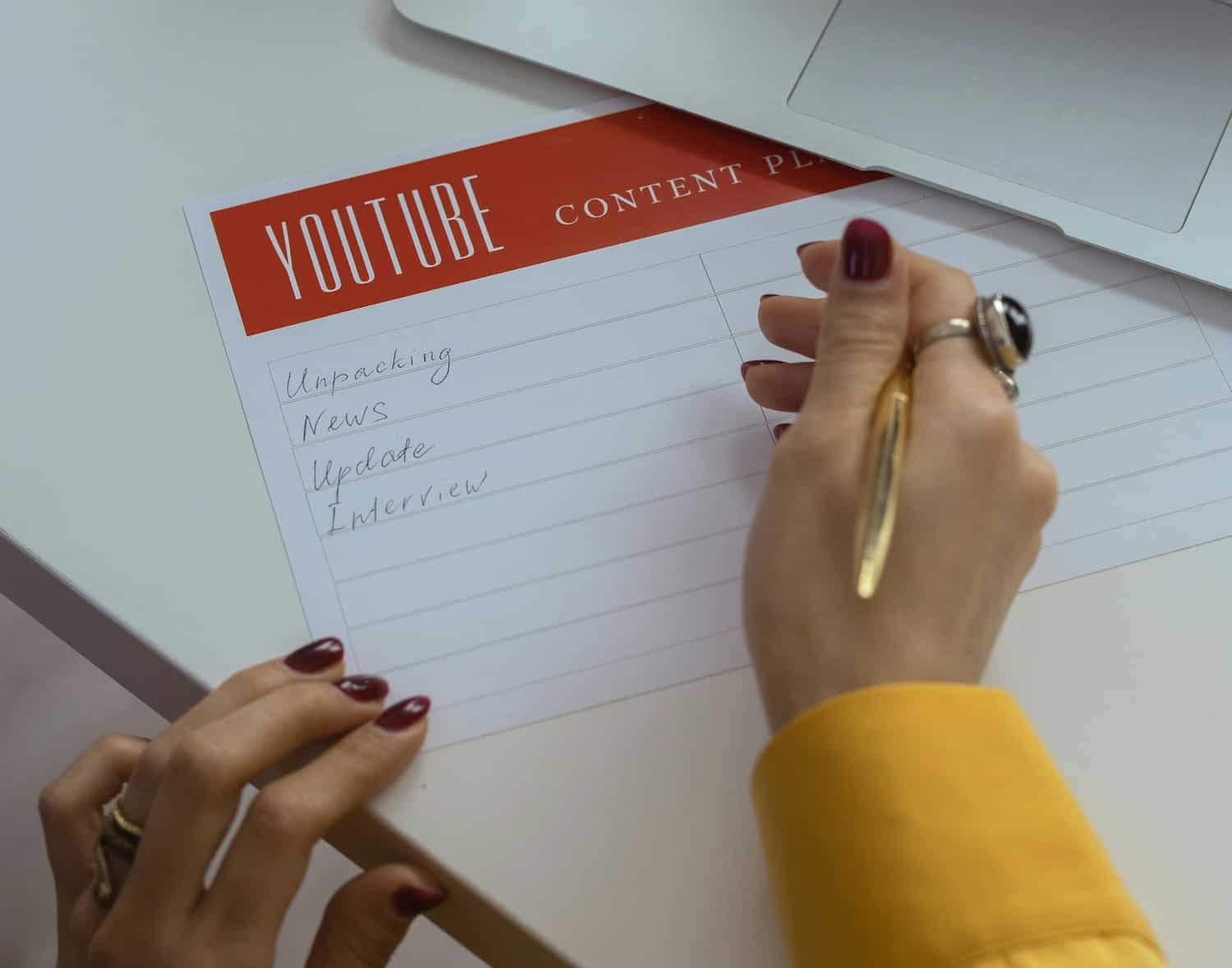 A woman creating a content plan to monetize her Youtube shorts videos