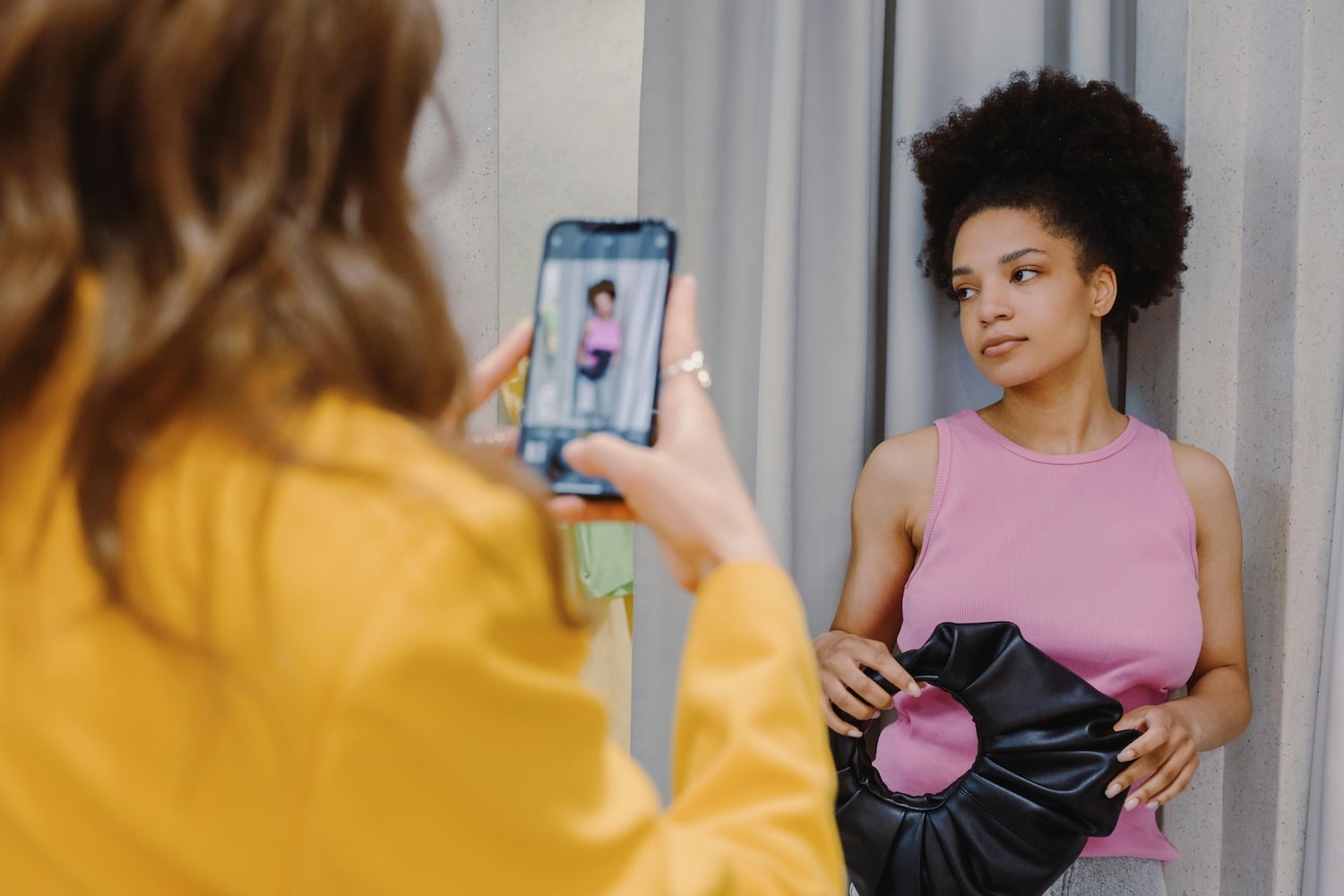 A woman recording content to take advantage of YouTube Shorts monetization.